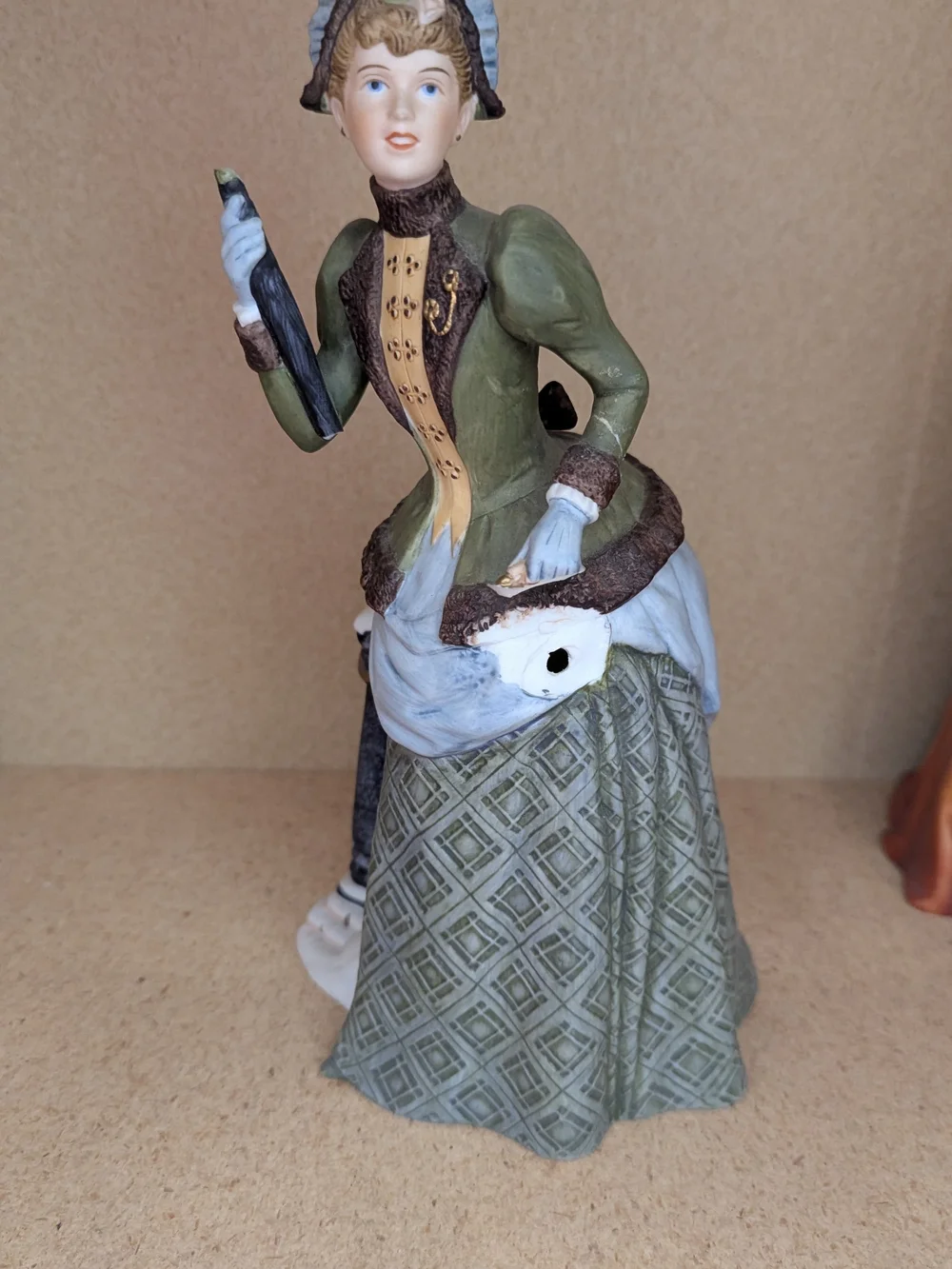 Avon Porcelain Award Figurine in Olive Green and White